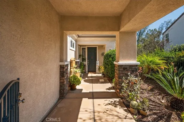 a view of house with patio outdoor seating space
