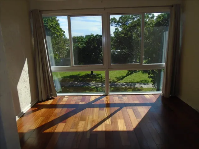 a view of a large window with an outdoor space