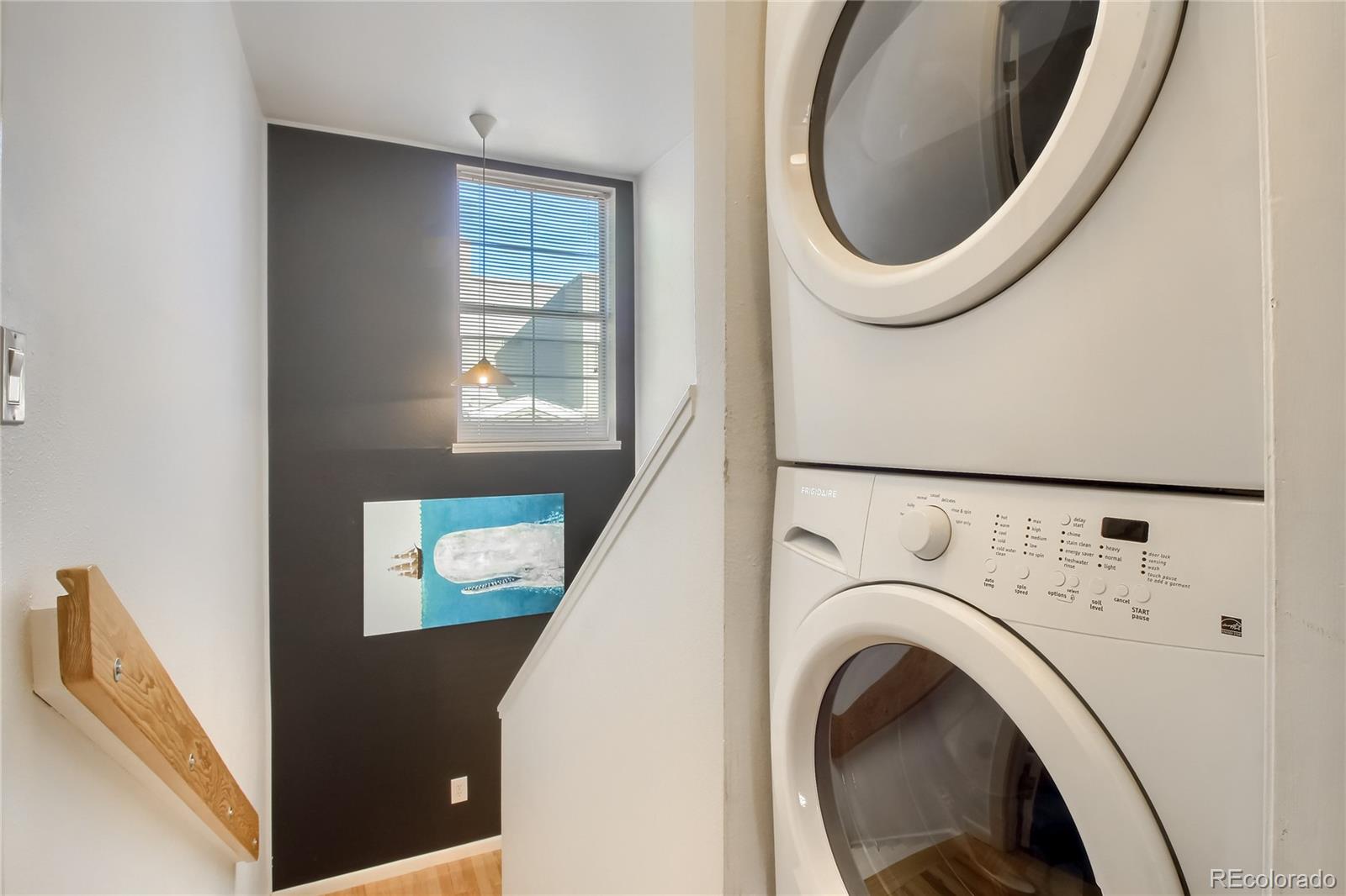1300 Garfield Street, Unit 2 Denver, CO 80206 - Photo 26 of 34 a view of a bedroom with washer and dryer