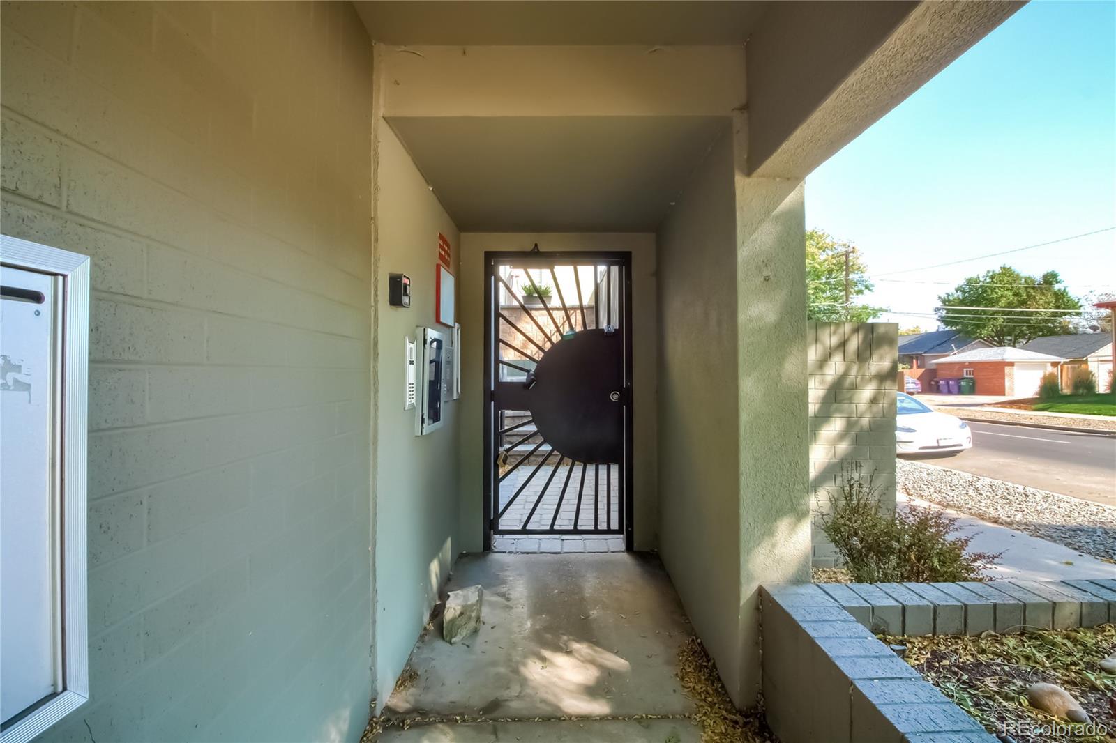 1300 Garfield Street, Unit 2 Denver, CO 80206 - Photo 32 of 34 a view of a porch