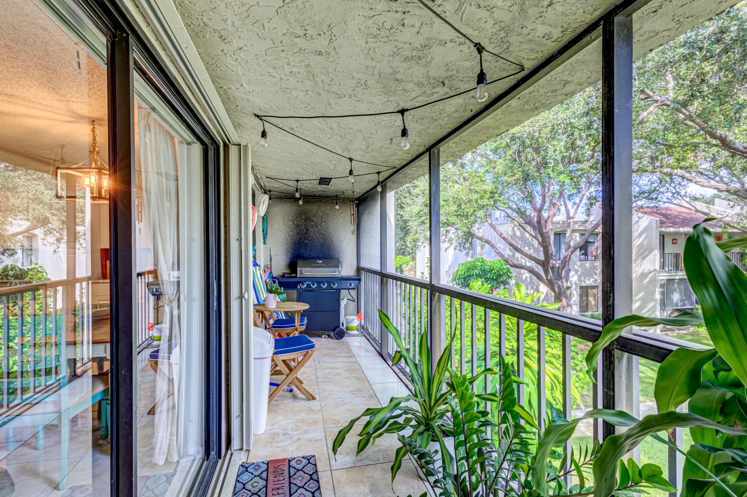 150 Pineview Road, Unit L5 Jupiter, FL 33469 - Photo 25 of 50 Screened patio