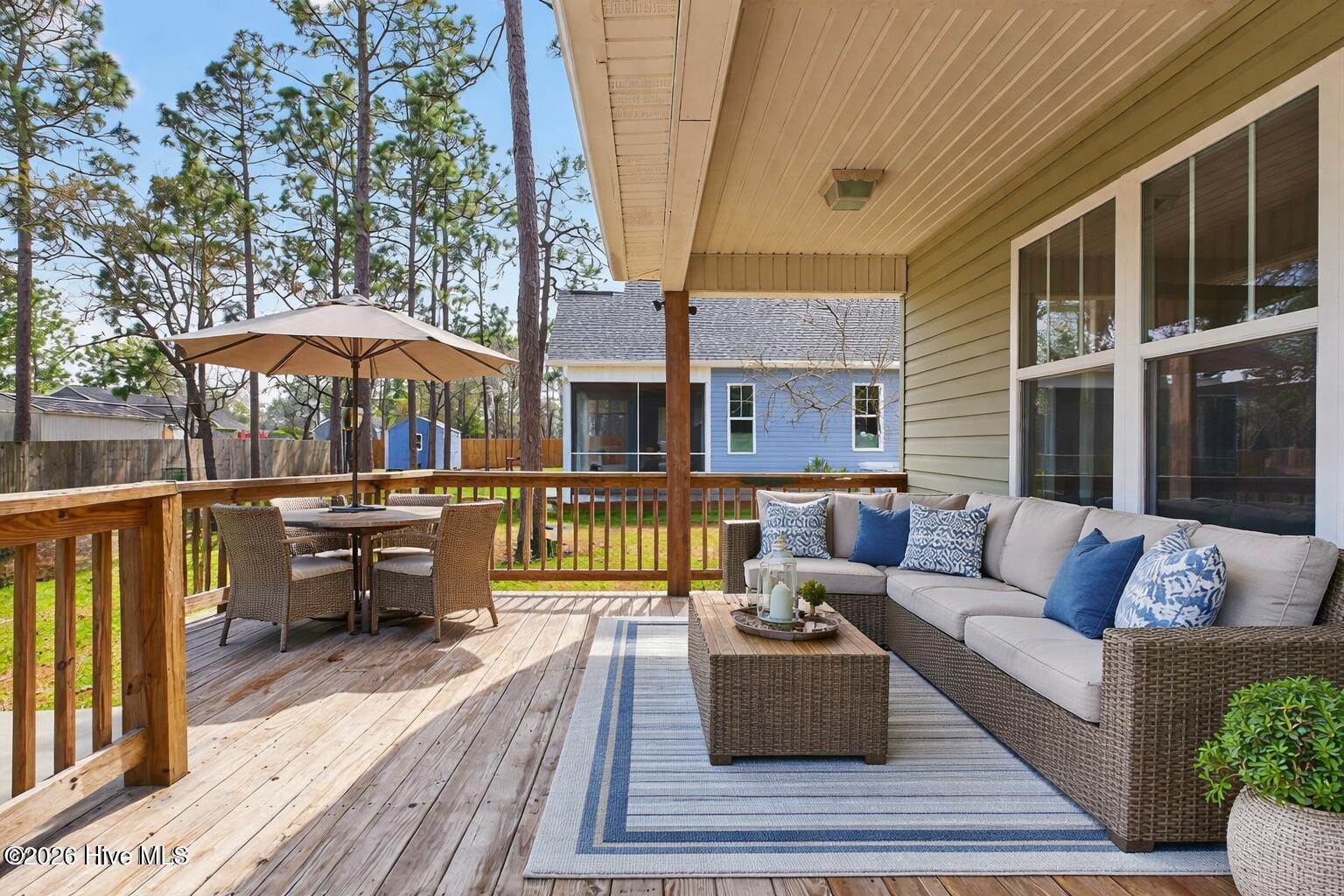 2020 Albemarle Road Southport, NC 28461 - Photo 37 of 61 Coastal deck with wicker furniture