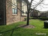 11747 Sycamore Road, Unit 12 Plymouth, MI 48170 - Photo 2 of 14 SYCAMORE SIDE 1.jpg