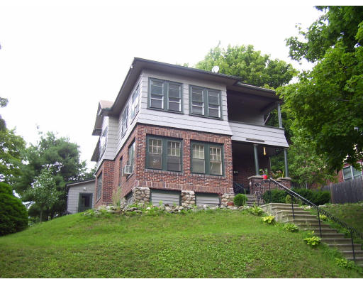 24 Colonial Road Worcester, MA 01602 - Photo 1 of 11 a front view of house with a garden