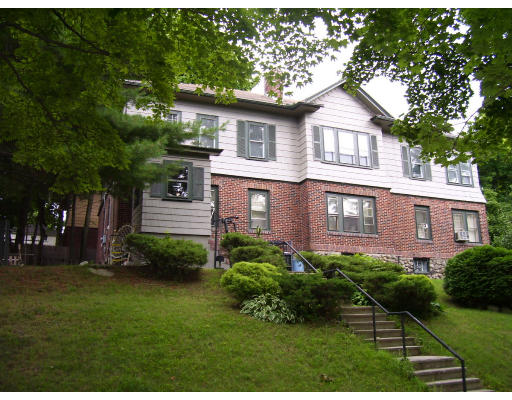 24 Colonial Road Worcester, MA 01602 - Photo 2 of 11 a front view of a house with a yard