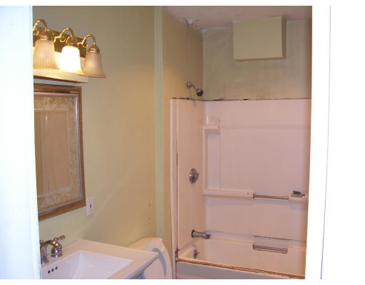 24 Colonial Road Worcester, MA 01602 - Photo 8 of 11 a bathroom with a bathtub and a sink