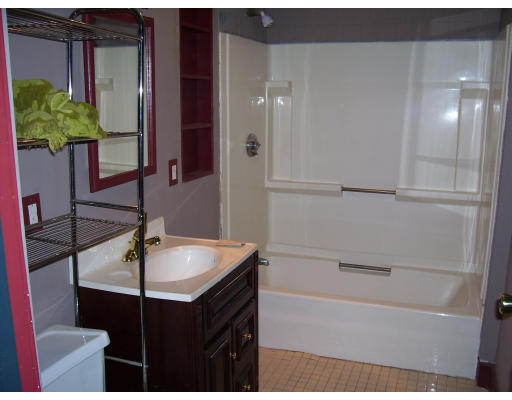 24 Colonial Road Worcester, MA 01602 - Photo 9 of 11 a bathroom with a sink and a bathtub