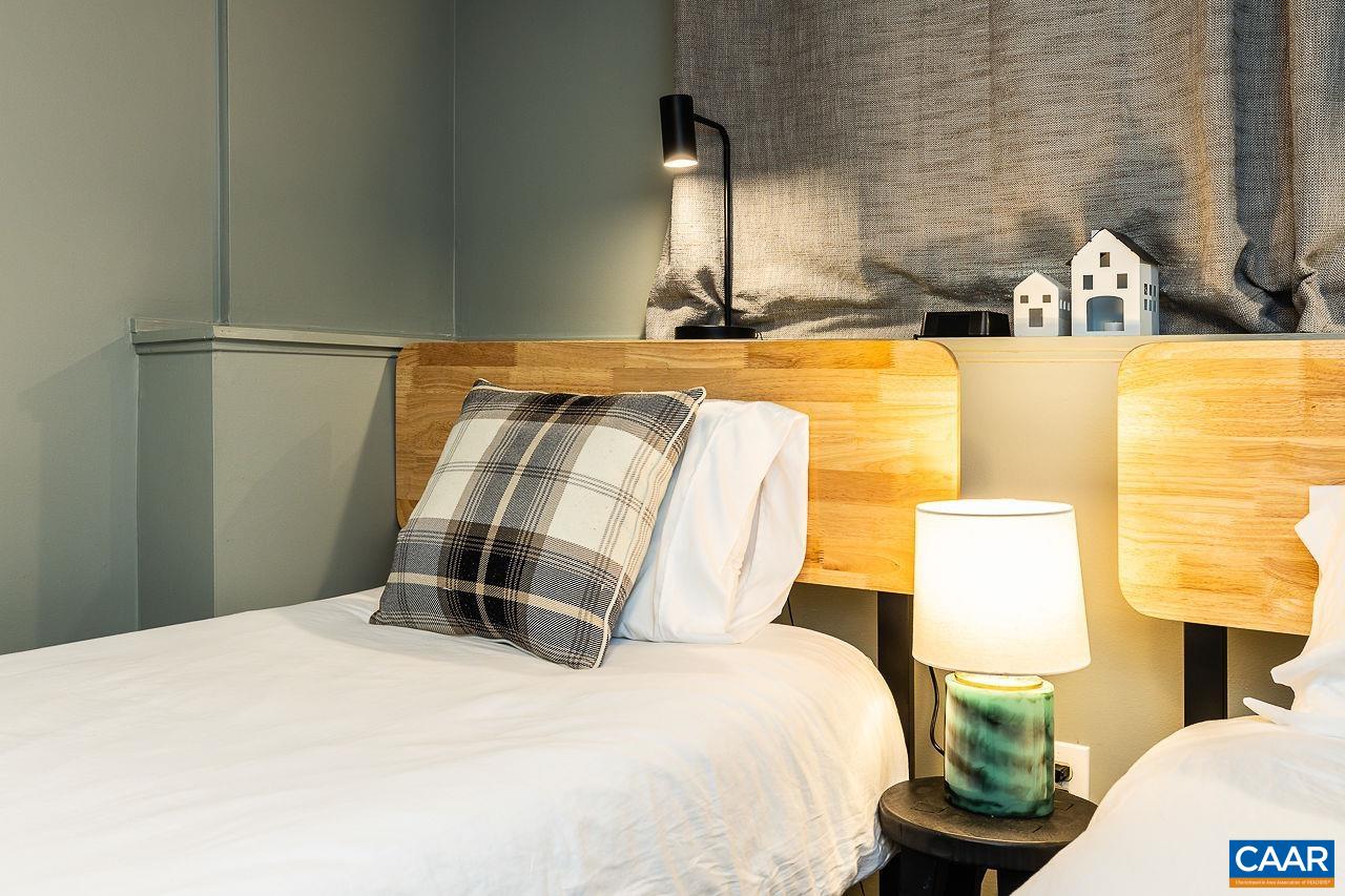 449 3 Ridges Wintergreen, VA 22967 - Photo 17 of 21 a bedroom with a bed and a mirror