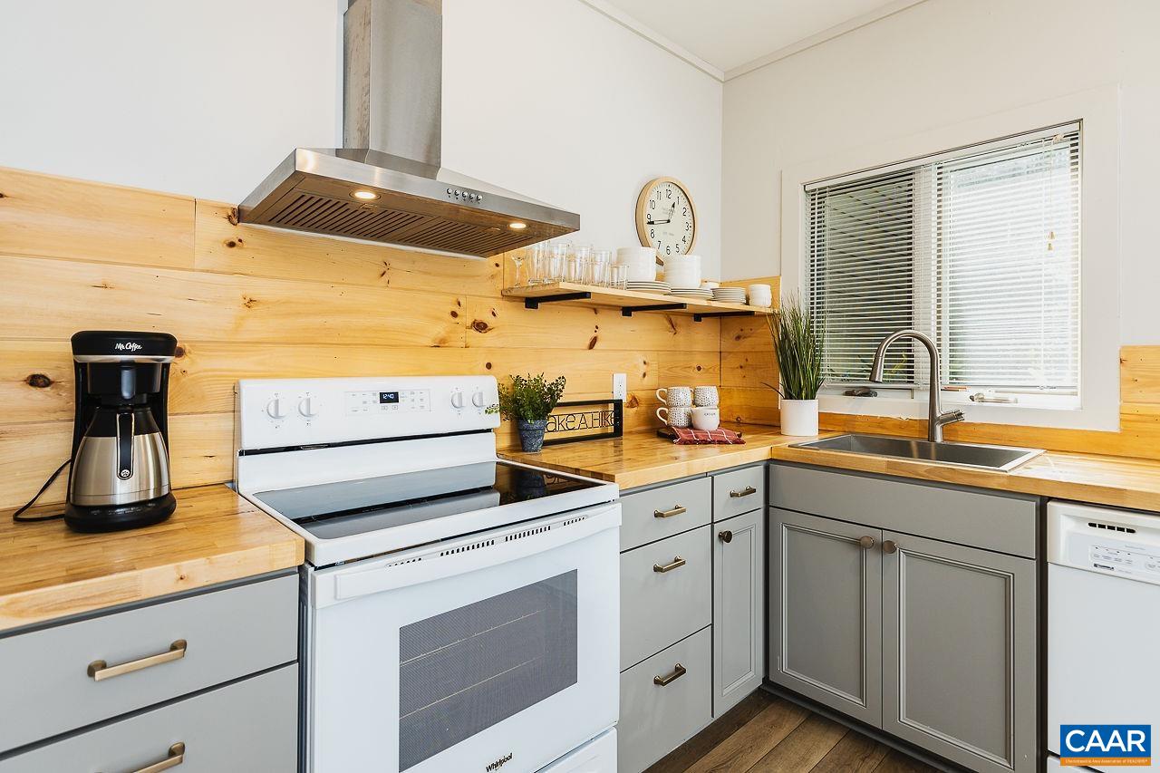 449 3 Ridges Wintergreen, VA 22967 - Photo 10 of 21 a kitchen with cabinets appliances and a counter space