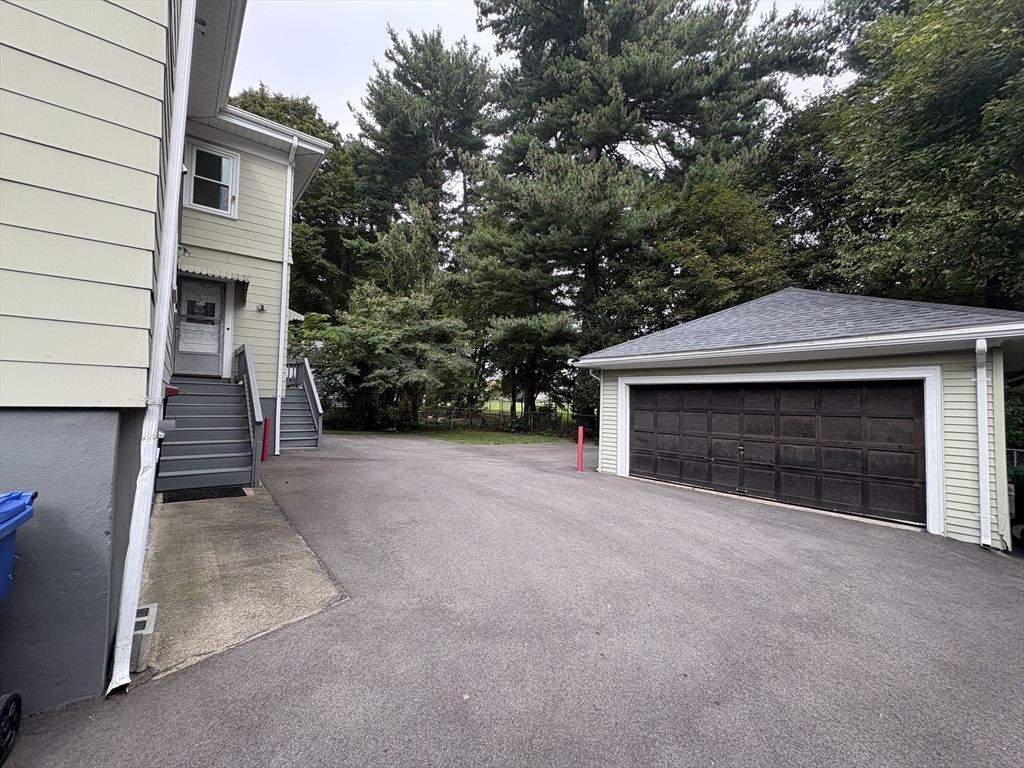 97 Warwick Road, Unit 97 Newton, MA 02465 - Photo 12 of 24 a view of house and outdoor space