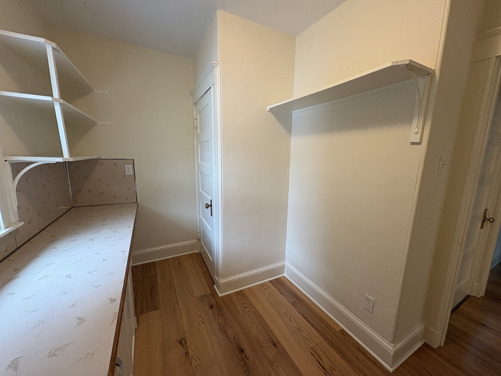 97 Warwick Road, Unit 97 Newton, MA 02465 - Photo 19 of 24 a view of wooden floor