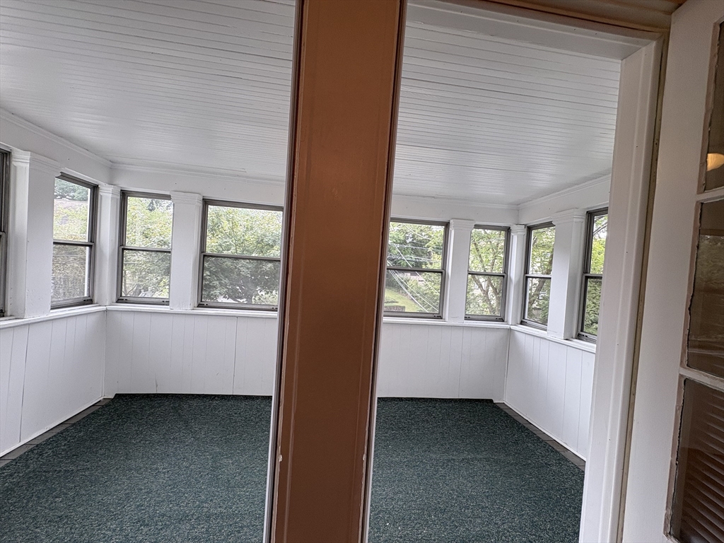 97 Warwick Road, Unit 97 Newton, MA 02465 - Photo 24 of 24 an empty room with windows