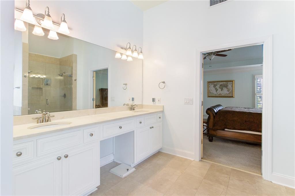3522 Ivy Manor Road Southeast Smyrna, GA 30080 - Photo 18 of 47 a en suite bathroom with a double vanity sink and a mirror