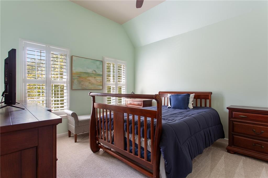 3522 Ivy Manor Road Southeast Smyrna, GA 30080 - Photo 22 of 47 a bedroom with a bed window and a table in it