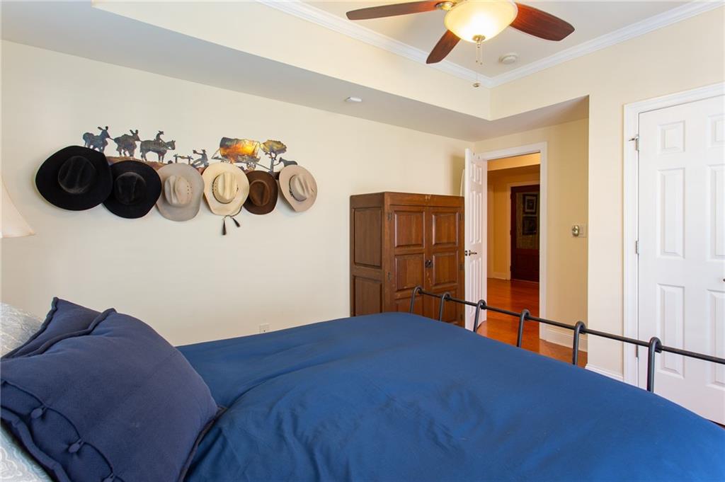 3522 Ivy Manor Road Southeast Smyrna, GA 30080 - Photo 27 of 47 a bedroom with a bed and cabinets