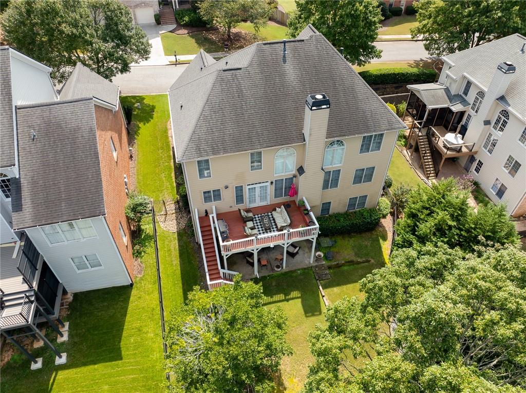 3522 Ivy Manor Road Southeast Smyrna, GA 30080 - Photo 45 of 47 an aerial view of a house with swimming pool and large trees
