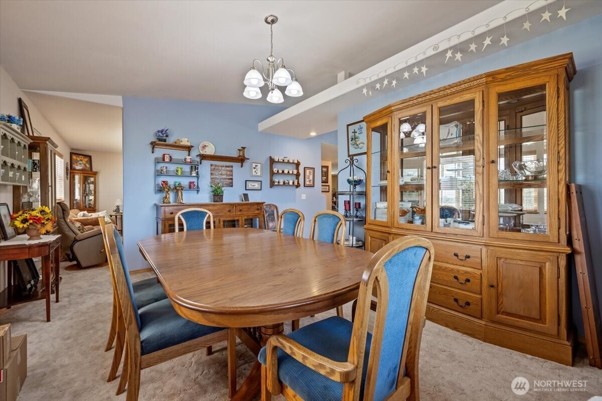 157209 West North River Road Prosser, WA 99350 - Photo 14 of 40 a view of a dining room with furniture window and wooden floor