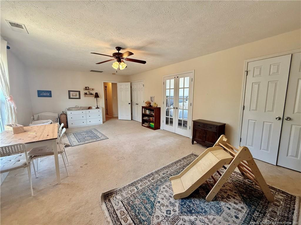 234 Pender Road Spring Lake, NC 28390 - Photo 23 of 39 a bed room with a bed and furniture