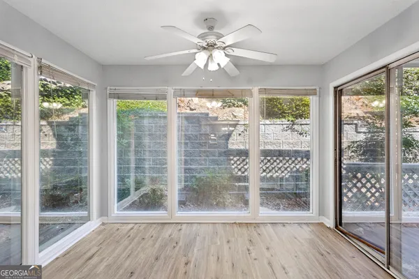 a view of a room with a large window