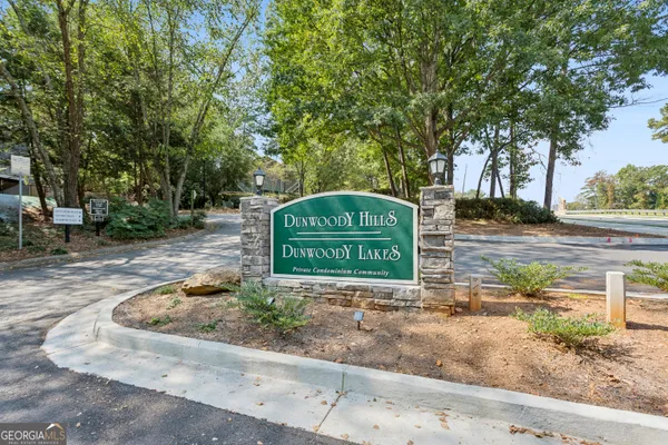 a house with trees in the background