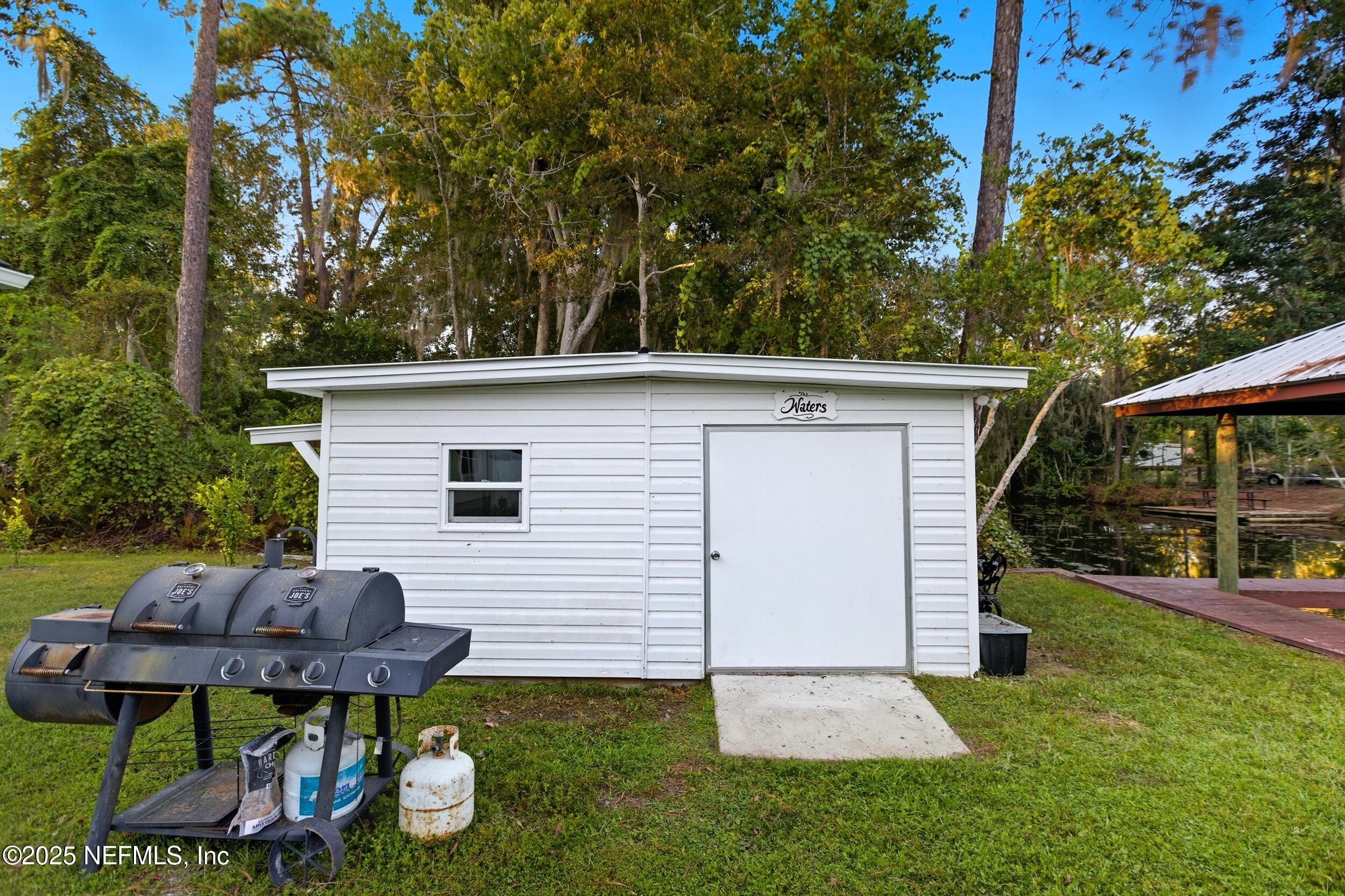 128 Santa Rosa Street Florahome, FL 32140 - Photo 41 of 57 Cooled and Electrically Powered Shed