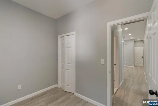 a view of a room that has a window in it