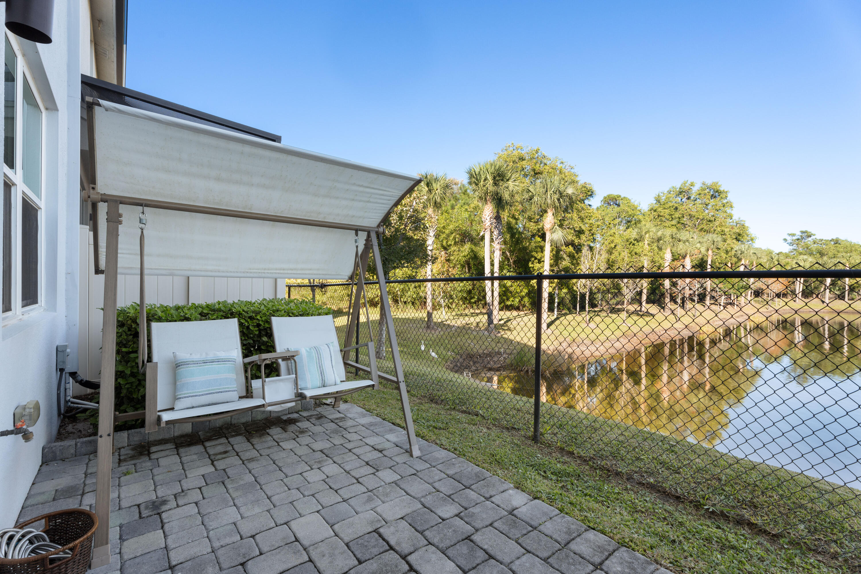 3931 Southeast Mentmore Lane Stuart, FL 34997 - Photo 26 of 33 a view of swimming pool with seating space