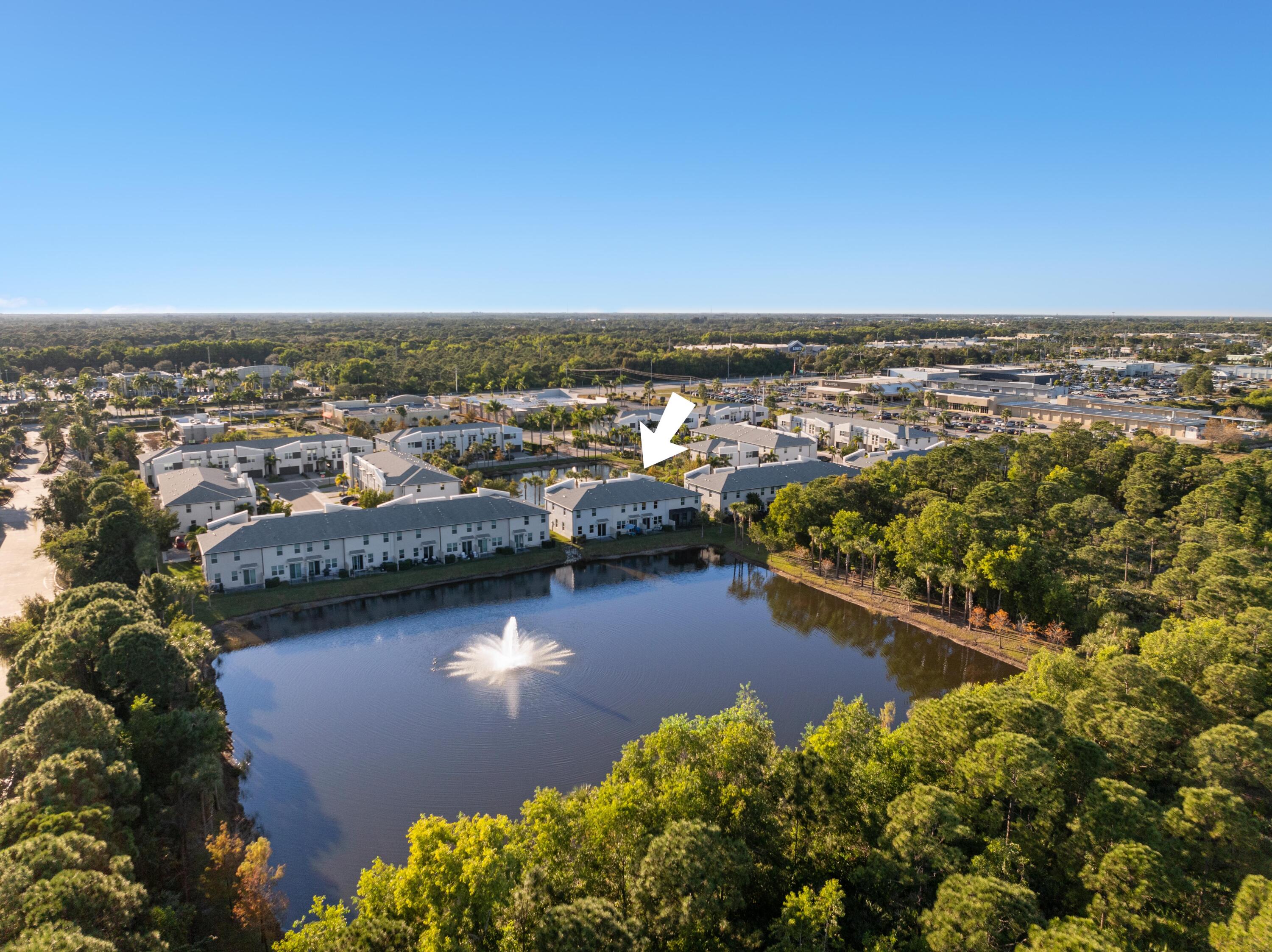 3931 Southeast Mentmore Lane Stuart, FL 34997 - Photo 30 of 33 an aerial view of a residential houses with outdoor space and seating