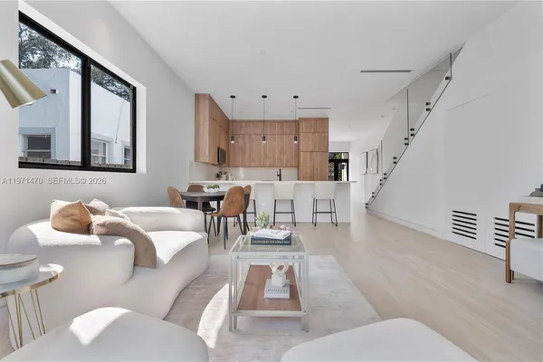 a kitchen with sink and window