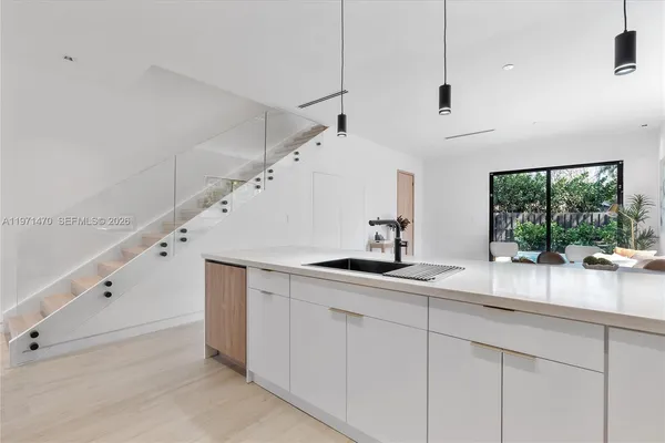 a view of a room with a large window