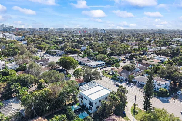 a picture of a bench in front of a wall