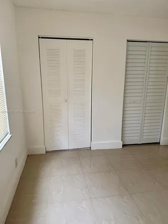 an empty room with closet