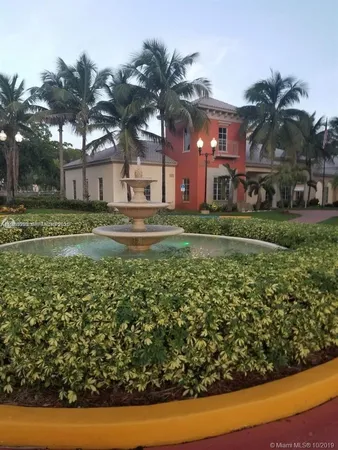 a house view with a garden space