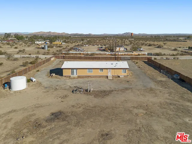 a view of a road with an ocean