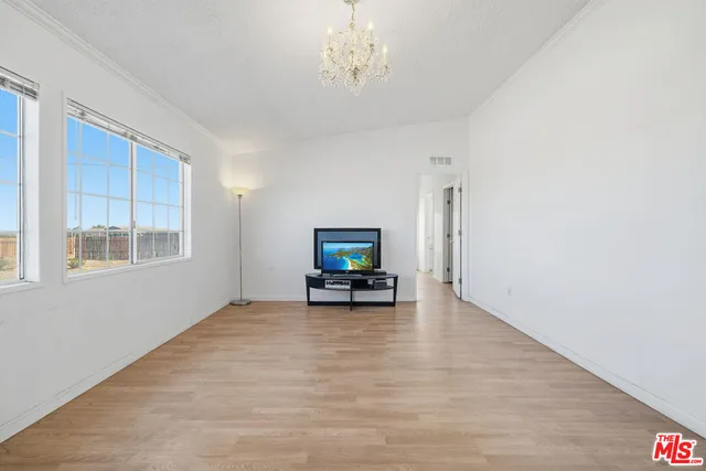 a view of livingroom with furniture and window
