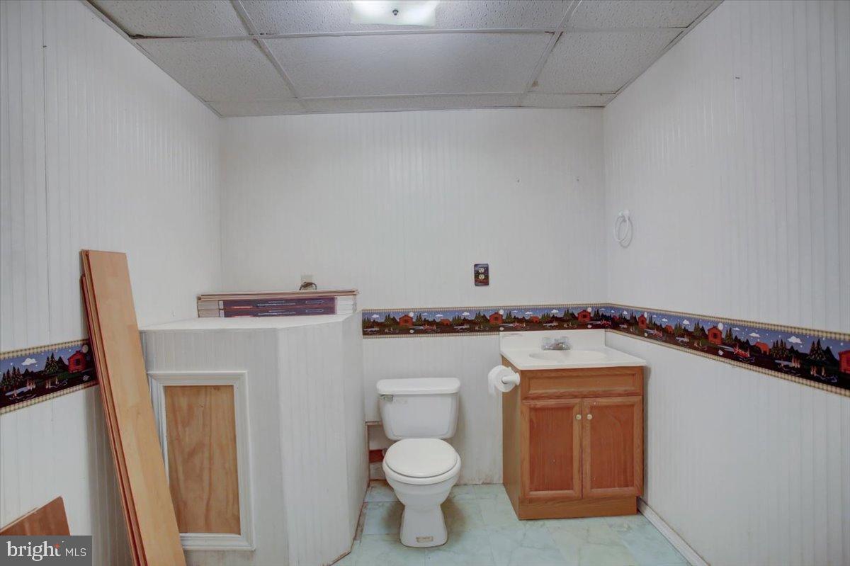 10744 Coral Ridge Road Fayetteville, PA 17222 - Photo 32 of 40 a bathroom with a toilet and a sink