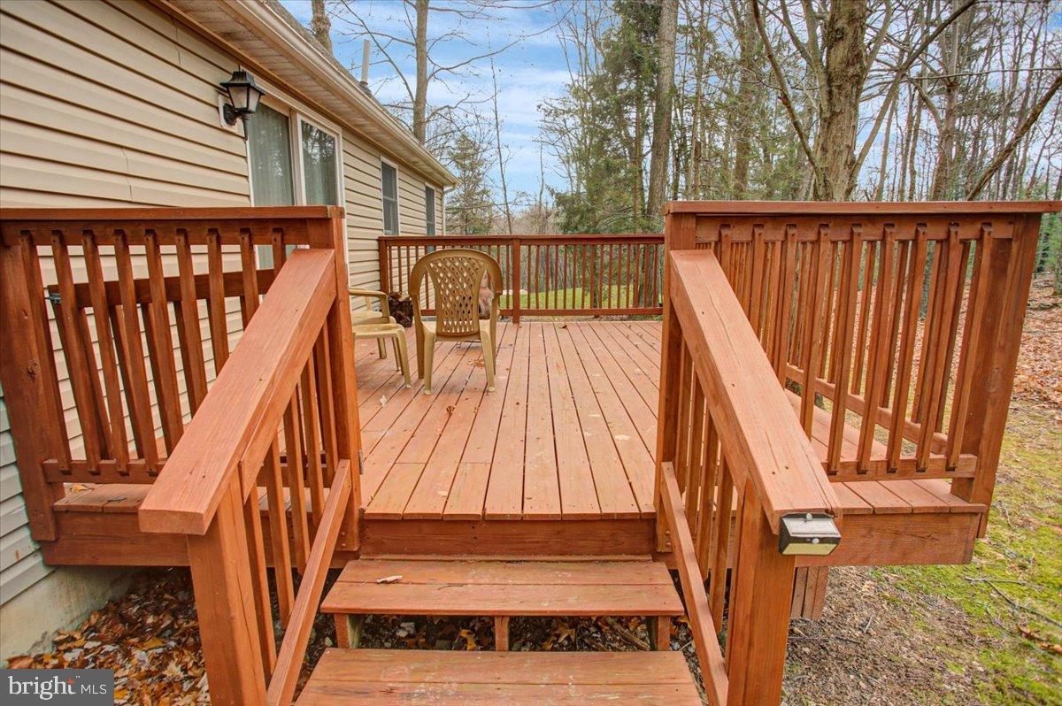 10744 Coral Ridge Road Fayetteville, PA 17222 - Photo 38 of 40 a view of outdoor space with deck and wooden floor