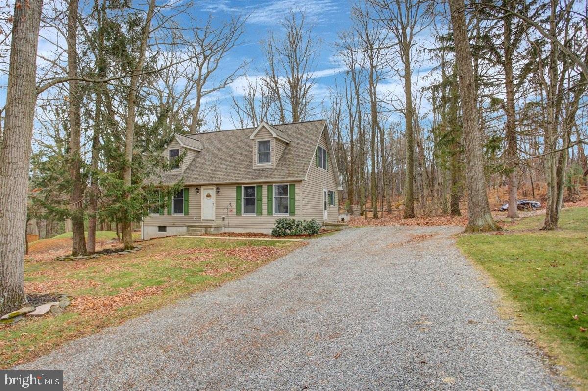 10744 Coral Ridge Road Fayetteville, PA 17222 - Photo 40 of 40 a view of house with outdoor space and sitting area