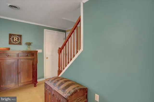 a view of entryway with stairs