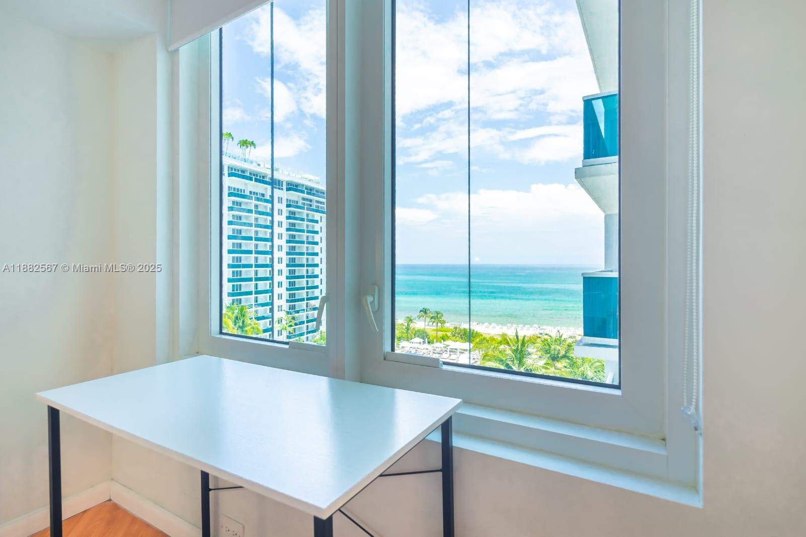 2301 Collins Avenue, Unit 1023 Miami Beach, FL 33139 - Photo 13 of 15 a view of a room that has a bed and a window