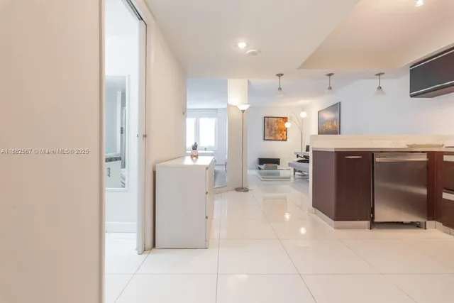 a view of a kitchen with a sink