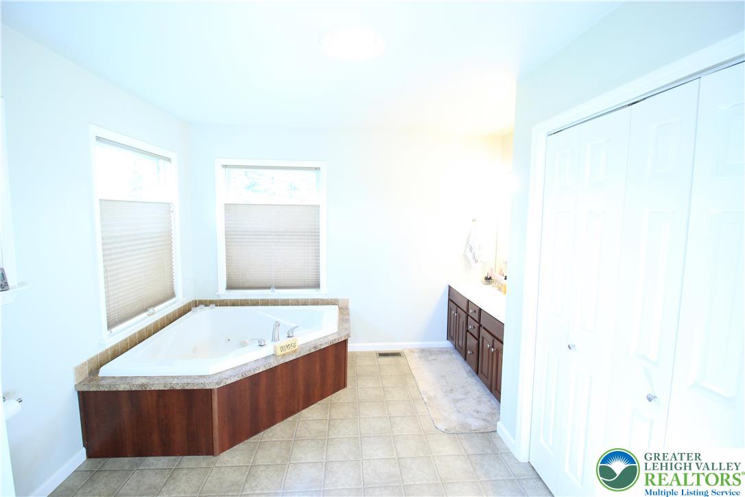 472 Bauer Road Bath, PA 18014 - Photo 12 of 47 a bathroom with a bathtub and a sink