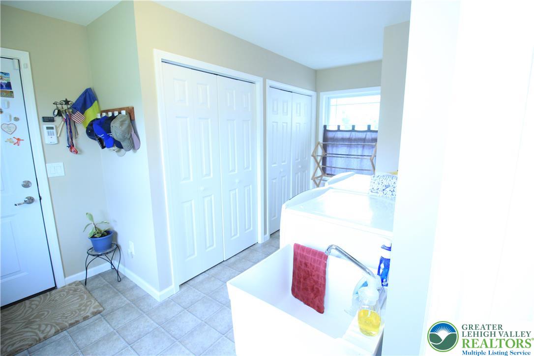 472 Bauer Road Bath, PA 18014 - Photo 13 of 47 a bedroom with a bed and a couch