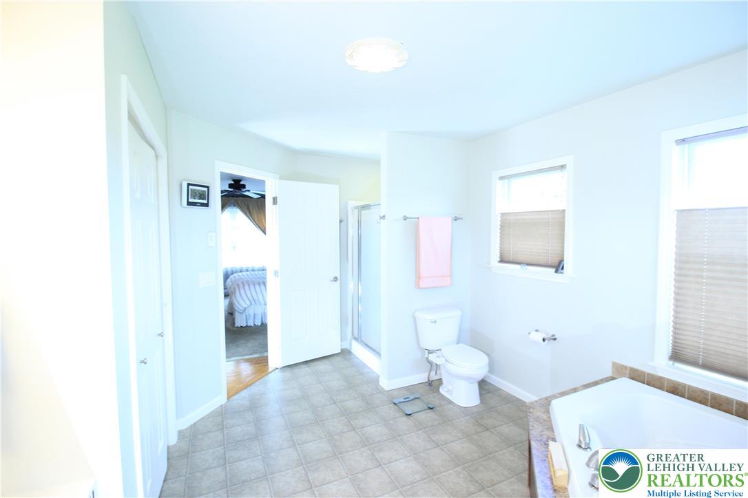 472 Bauer Road Bath, PA 18014 - Photo 15 of 47 a bathroom with a toilet sink and shower