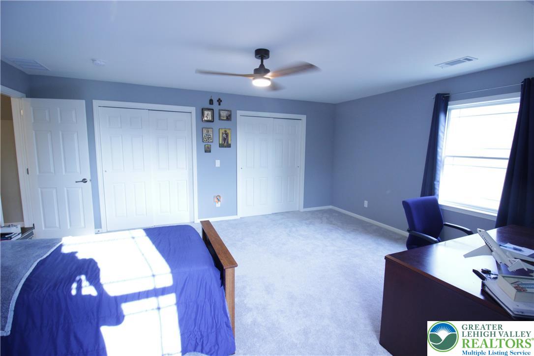 472 Bauer Road Bath, PA 18014 - Photo 28 of 47 a bedroom with a bed and a window