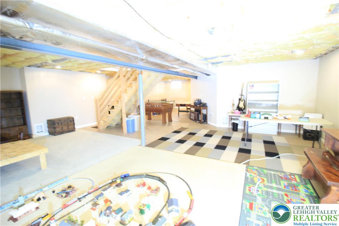 472 Bauer Road Bath, PA 18014 - Photo 35 of 47 a view of kitchen island with stainless steel appliances kitchen island granite countertop a sink and cabinets