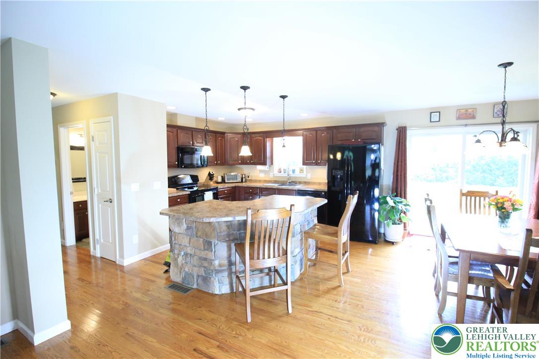 472 Bauer Road Bath, PA 18014 - Photo 7 of 47 a view of a kitchen and dining room