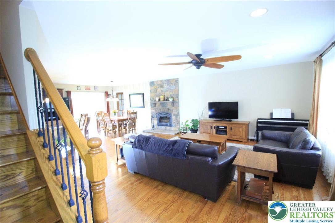 472 Bauer Road Bath, PA 18014 - Photo 9 of 47 a living room with furniture and a flat screen tv