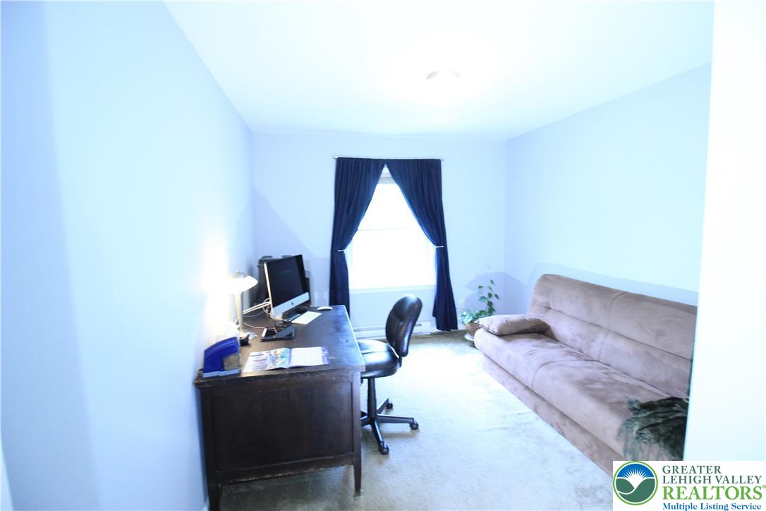 472 Bauer Road Bath, PA 18014 - Photo 10 of 47 a living room with furniture and a window