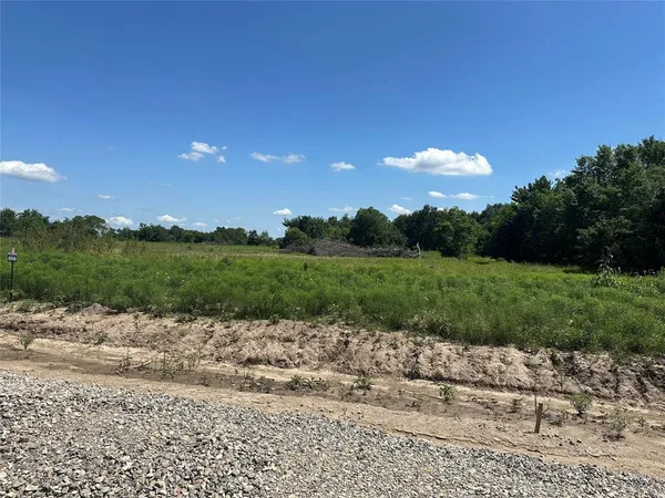 a view of a lake and a yard